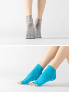 Non-slip yoga socks with grip dots and toe design for professional dance and fitness sports.