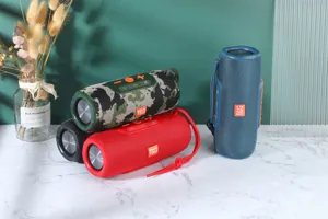 Haut-parleur Bluetooth sans fil portable avec des basses puissantes et un design cylindrique.