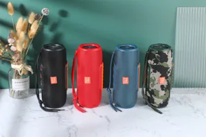 Haut-parleur Bluetooth sans fil portable avec basses puissantes et sangle de transport.