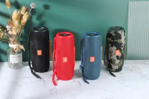 Haut-parleur Bluetooth sans fil portable avec design en tissu maillé, basses et couleurs.
