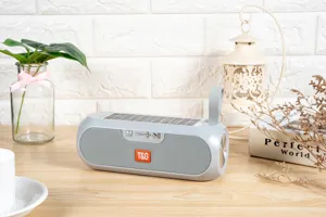 Portable solar bluetooth speaker with handle, outdoor wireless audio device with solar panel.