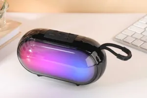 Portable wireless Bluetooth speaker with vibrant RGB lighting, capsule design and deep bass sound.