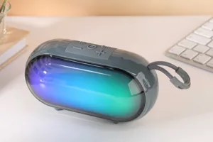 Detailed view of the portable wireless Bluetooth speaker featuring vibrant RGB lighting effects.