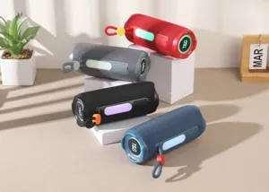Portable outdoor wireless Bluetooth speaker with vibrant RGB lights and deep bass stereo sound.