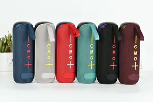 Enceinte Bluetooth portable avec lumiere LED et TWS en tissu colore pour la musique.