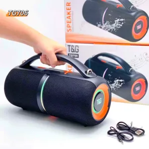 Portable wireless Bluetooth speaker with deep bass, RGB lights, and handle for outdoor music.