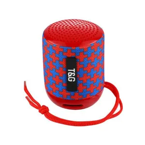 Vista di dettaglio dell'altoparlante Bluetooth portatile con motivo a croce e cordino.
