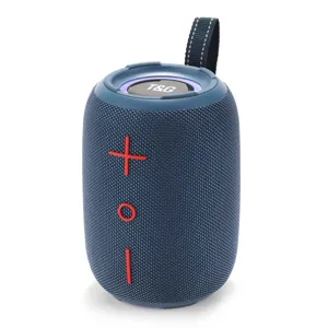 Haut-parleur Bluetooth sans fil portable en détail, tissu bleu avec boutons rouges.