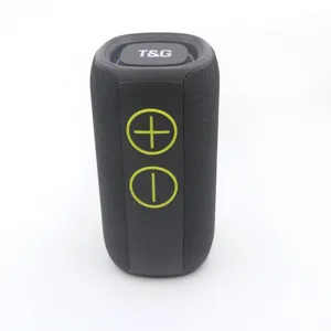 Close-up detail of the portable wireless bluetooth speaker showing fabric mesh and buttons.
