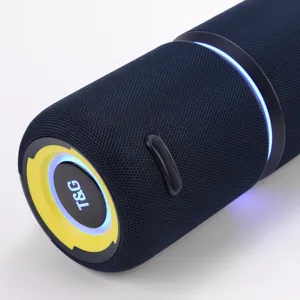 Portable bluetooth speaker detail view showing blue fabric mesh and bright LED light.