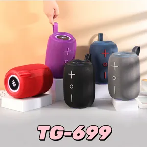 Enceinte Bluetooth sans fil portable avec tissu et LED colorées pour l'extérieur.