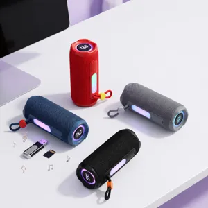 Portable wireless Bluetooth speaker with TWS stereo, colorful ambient light and multiple playback modes.