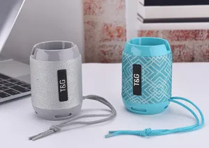 Portable wireless Bluetooth speaker with convenient lanyard and desktop phone stand function.
