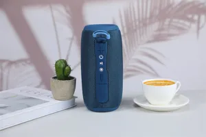 Portable wireless bluetooth speaker with deep bass, waterproof outdoor mini audio device.