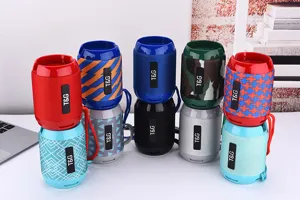 Portable TG129C wireless bluetooth speaker with phone stand and deep bass detail view.