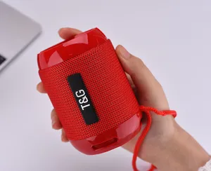 Portable wireless Bluetooth speaker detail showing mesh fabric texture and compact red body design.