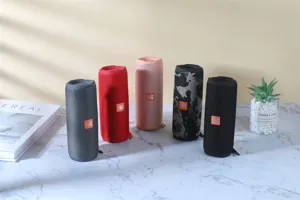 Portable wireless bluetooth speaker with deep bass, stylish cylindrical design for outdoor use.