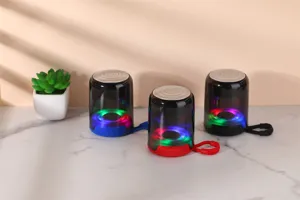 Portable wireless Bluetooth speaker with colorful LED lights, outdoor mini audio with strap.