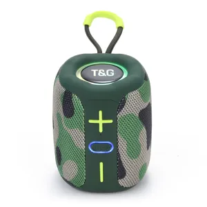 Portable bluetooth speaker detail view showing camouflage pattern, buttons and lanyard.