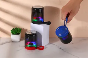 Portable wireless Bluetooth speaker with colorful LED lights, deep bass and handy lanyard.