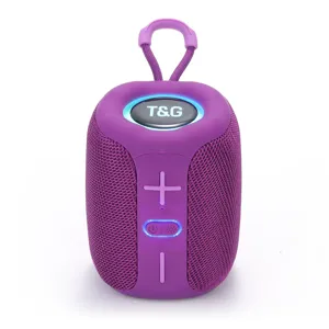 Compact purple wireless Bluetooth speaker featuring LED light and carrying loop for outdoor music.
