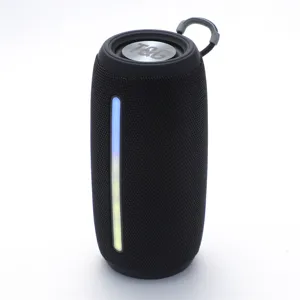 Portable bluetooth speaker detail view, black mesh fabric design with vibrant LED strip and strap.