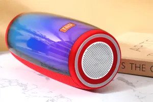 Enceinte Bluetooth sans fil avec lumières LED colorées, basses profondes et design portable.