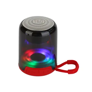 Portable wireless bluetooth speaker detail view with colorful LED lights and red base.