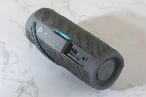 Portable wireless bluetooth speaker detail view, waterproof outdoor audio with rich heavy bass.