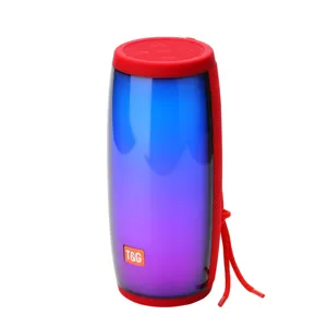 Vue détaillée de l'enceinte Bluetooth sans fil portable avec lumières LED et basses puissantes.