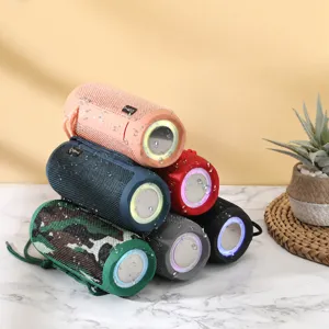 Portable wireless bluetooth speaker with waterproof fabric mesh and colorful bass radiator lights