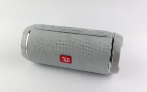 Altoparlante Bluetooth wireless portatile impermeabile con design in tessuto grigio.