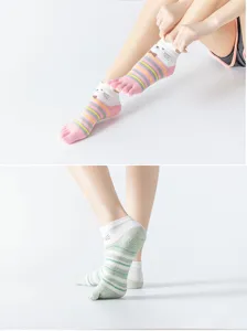 Non-slip five toe yoga socks with cute cartoon cat design, perfect for pilates and dance.