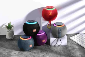 Portable spherical Bluetooth speaker with colourful RGB light, TWS wireless mini outdoor soundbox.