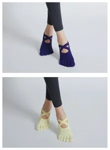 Five-toe double strap yoga socks detail view, anti-slip breathable pilates athletic footwear.