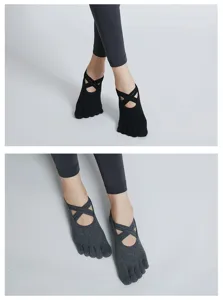 Close-up detail of the anti-slip five-toe yoga socks featuring double cross strap design for pilates.