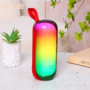 Enceinte Bluetooth mini portable avec lumières colorées RGB et basses puissantes.