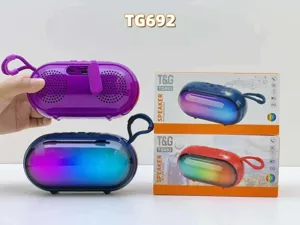 Compact portable wireless Bluetooth speaker detail view with vibrant RGB lights and carrying strap.