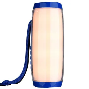 Vue détaillée d'enceinte Bluetooth sans fil portable avec lumières LED colorées et sangle bleue.