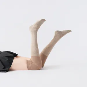 Chaussettes de yoga montantes color-block avec picots antidérapants pour le fitness.