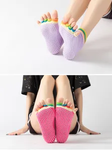 Anti-slip yoga toe socks with five-toe design and dotted silicone grip for steady workouts.