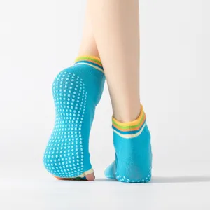 Professional non-slip yoga five-toe socks with silicone grip dots for women dance sports.