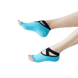 Calzini da yoga senza dita antiscivolo con cinturini incrociati neri per pilates donne.