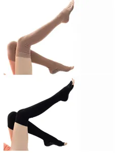 Over-the-knee yoga socks with toeless five-finger design and anti-slip grip sole for workouts.