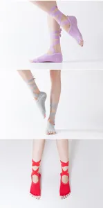 Detail view of non-slip five-toe yoga socks with wrap straps, open toe design for dance and pilates.