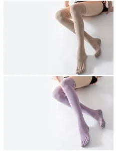 Over-the-knee five toe yoga socks with anti-slip grip soles for pilates and fitness wear.
