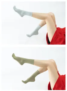 Morandi color yoga socks detail shot, non-slip grip soles, comfortable minimalist design for fitness.