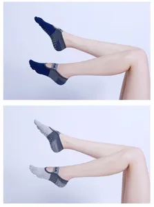 Comfortable five-toe yoga socks with anti-slip grip dots and elastic strap for fitness.