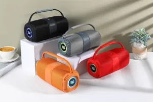 Haut-parleur Bluetooth portable avec lumières LED, design en tissu, son puissant sans fil.