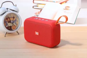 Portable wireless Bluetooth speaker with deep bass, TF card slot, and convenient silicone strap.